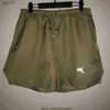 E short pour hommes short de bain short de bain imprimé lettres réfléchissantes short en maille américain hipster casual gym inaka main coupe surdimensionnée hommes et femmes couples L230520