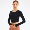 Chemises actives couleur unie à manches longues chemise de yoga Gym sport haut court femmes Fitness col rond T-Shirt décontracté vêtements de sport serrés avec pouce