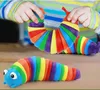 ナメクジの毛虫減圧玩具3D幼児のための明確なナメクジのおもちゃの女の子男の子レインボーフィジェットウィググル感覚スラグワームおもちゃ誕生日プレゼント