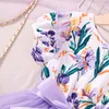 Ropa de bebé para niños Vestidos de moda para niñas Vestido de manga corta con estampado de flores de malla de gasa 2 colores disponibles al por mayor