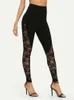 Leggings femmes Sexy taille haute Leggings en dentelle noire femmes dames dentelle florale panneau latéral découpé Leggings noirs S-2XL