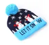 2022 Nya Santa Beanies Led Glowing Christmas Gift Light-up tröja Stickad hatt med LED-lampor Xmas Pompom Hatts för vuxna barndekoralkinglinje