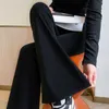 Calças femininas Capris cor lisa cintura feminina diagonal totalmente combinada ajuste ultrafino cintura alta elástica boca de sino coreana moda rua calças largas P230602