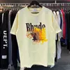 Designer Mode Vêtements Tees Tshirt Rhude Été Nouveau Dégradé Couleur Motif Impression Lâche Casual Hommes Femmes À Manches Courtes High Street Couple Col Rond Tshirt Tren