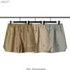 E shorts masculinos shorts de banho de grife shorts de malha com estampa reflexiva de letras americanas hipster casual academia inaka mão superdimensionada para casais masculinos e femininos L230520