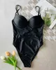 Kvinnors badkläder 2023 Ny Sexig Black Push Up One Piece Swimsuit Women Monokini Backless Cut Out Bymkläder Ladies Solid Swim Bathing Suit Trikini J230603