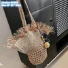 Factory wholesale ladies shoulder bags 2 colors summer travel holiday straw beach bag hat fashion handbag personalized hair ball pendant woven handbags