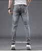 Diseñador de jeans para hombres 8A Top Original B urberry Pantalones cortos y pantalones tienda en línea Primavera Nuevo algodón Versión coreana Slim Fit Marca Smoky Grey Bordado