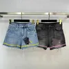 Shorts pour femmes concepteur 2023 été nouvelle vague ruban Triangle série ourlet brut pantalon lavage dégradé taille haute Denim UAB9