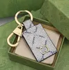 Man Checkains Luxury Leather Car Key Chains Designer Printing Checkemains Unisex Nisex The Nearless Steel Fashion Bag Sag Accessories Кольцо с коробкой с коробкой