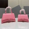 Bolsa de ombro de couro de designer de moda com alça ajustável ampulheta em relevo fecho magnético de rebites bolsa tiracolo elegante E23