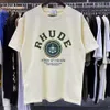 Designer Roupas Tees 2023 Verão Nova Moda Rhude Versátil Verde Impressão Solta High Street Casual Manga Curta Camiseta para Homens Mulheres Cotton67