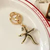 Diamond-encrusted Ocean Creative Alloy Bag Keychain Starfish Brooch Keychain Dual-use Car Pendant 1223610