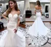 Wit Lace prachtige zeemeermin trouwjurken sexy backless pure Appliques lange mouw sweep trein bruidsjurken met knop bedekt terug