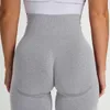 Tenue de yoga Fesses de pêche Leggings de remise en forme Gymnase pour femmes Short de course serré Pantalon à trois points pour la hanche Taille haute Short de yoga sans couture 230603