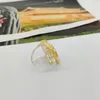 2023 خاتم فخم ذو جودة عالية مع تصميم شفاف مطلي بالذهب عيار 18 قيراطًا به ختم صندوق PS7053B