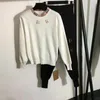 Sugios de pistas para mujeres Fall Knit 2 piezas Diseñador de chaqueta de lujo suéter de gran tamaño Píldoras de calzoncillo