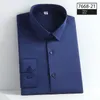 Chemises décontractées pour hommes de haute qualité chemise bleue sans couture grande taille hommes à manches longues coupe ajustée bouton élastique sans repassage affaires garçons formels