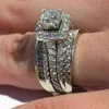 Солитарное кольцо Huitan Великолепные обручальные кольца Женщины Micro Paved Cz Stone Full Bling Iced Out Обручальные группы аксессуары современные модные украшения Z0603