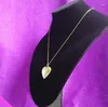 Подвесные ожерелья оптом 10 рождественских подарков в форме сердца в форме каркаса с тисненой ожерельемой ожерельем.