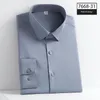 Chemises décontractées pour hommes de haute qualité chemise bleue sans couture grande taille hommes à manches longues coupe ajustée bouton élastique sans repassage affaires garçons formels