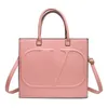 2023 nieuwe mode The Tote Bag Designer tas Totes Praktische Grote Capaciteit Effen crossbody Shopping Handtas Tassen