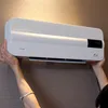 Обогреватели на стене электрического воздушного нагревателя стенка вентиляционного вентилятора висят теплый прохладный ветровый воздуходувший
