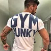 Diseñador masculino Deportes Marca de moda Muscle Fitness Brother Camiseta deportiva de manga corta Transpirable Estiramiento Hombres Ropa deportiva informal al aire libre