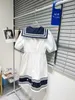 기본 캐주얼 드레스 디자이너 2023 스프링/여름 새 대학 스타일 해군 칼라 보우 노트 펜타 그램 거품 슬리브 셔츠 드레스 vpix