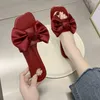 Kleine Daisy boog buiten dragen slippers vrouwelijke zomer nieuwe mode strand schoenen zachte zolen studenten zwangere vrouwen platte slippers