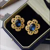 Retro Ear Studs Medieval Sunflower Modne temperament Nowe Perły Kolczyki E385