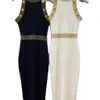 Womens 2023 مصممة جديدة تنورة نسائية جديدة عالية الجودة مشبك المعادن الطاقم Crewneck سترة في منتصف الطول الكعك فستان الورك بسيط وكبار ارتداء