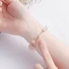 Pulseras con dijes Pulsera de cadena con cuentas de metal de cristal rosa Capas dobles Bola redonda Cuentas simples Enlace en la mano Brazalete chapado en oro Damen