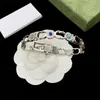 Kvinnor Bangle Silver Folding Buckle Fashion High End smycken inlagd med färgglada ädelstenar Flower Daisy Ladies Armband Party Lovers Gift