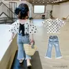 Kläderuppsättningar 2023 Girls 'Suit Summer Children's Polka Dot Chiffon Puff Sleeve T-shirt och Baby Girl Jeans Kids Set