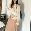 Pull Femme Solide Beige Pull Creux 2023 Printemps Dame Mince Trou Fendu Tricots Cool Hipster Gothique O Cou Extérieur Transparent