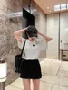 女性用Tシャツデザイナー春/夏の新しいレターコントラスト3D三角装飾緩い空気層TシャツJ2yy