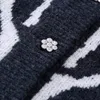 Kvinnors stickor faller 2023 Kvinnors mode Animal Print Jacquard Knit Coat Retro Casual Single Breasted Pocket Embelled tröja Cardigan
