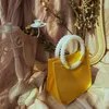 Sacs de soirée Rétro Jaune Satin Niche Lumière De Luxe Femmes Sac Pearl Tide Sacs À Main Pour 2023 Designer À La Mode Haut De Gamme Élégance Bureau