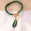 Hänge halsband mode överdriven barock abnormitet imitation pärla dropp gröna blad halsband retro klavikel malakitpärlor