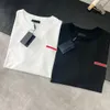 Projektant Pra Triangle Luksusowa marka T Shirt z literami Nowe koszule mężczyzna kobieta swobodne ubranie modne czarne białe koszulki letnie okrągłe szyję krótkie rękawy czyste bawełniane bawełniane