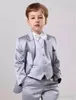 Costumes pour hommes Personnaliser Tuxedos garçon jaune Revers cranté Costume pour enfants Dernières conceptions de pantalons de veste Costumes de mariage / bal pour enfants (veste gilet cravate)