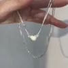 Collier d'aspiration magnétique de haute qualité et design à la mode, aimant de niche plein diamant collier de clavicule coeur