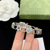 Kvinnor Bangle Folding Buckle Fashion High End smycken inlagd med färgglada ädelstenar Silverpläterad blomma daisy damarmband gåva