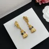 Klasyczne długie złoto urok Luksusowe projektantki kolczyki stadninowe Eleganckie kobiety biżuterii Prezent Para 18k złot