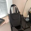 Kvinnors vävtelefon Messenger Bag Pu läderhandväska med kort handtag sommar lyxig designer trend axelväska lady tote