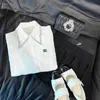 レディースパーカースウェットシャツデザイナー2023夏の新しいラインレタープリントビーズダイヤモンドラペルホワイトスリーブシルクシャツ女性WU20