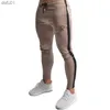 Sik Silk Męskie spodnie fitness chude spodnie wiosenne sprężyste kulturystyki trening spodni toru dolne spodnie men joggers brespants l230520