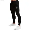 Sik Silk Męskie spodnie fitness chude spodnie wiosenne sprężyste kulturystyki trening spodni toru dolne spodnie men joggers brespants l230520