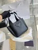 Luxury designer handbags prad Triangle logo tote bag Underarm bag basket Womens Men shoulder purse Cowhide crossbody clutch Magnetic snap closure lady fashion bags